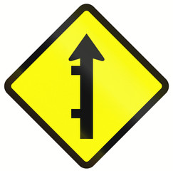 Indonesian road warning sign: Offset roads intersection ahead