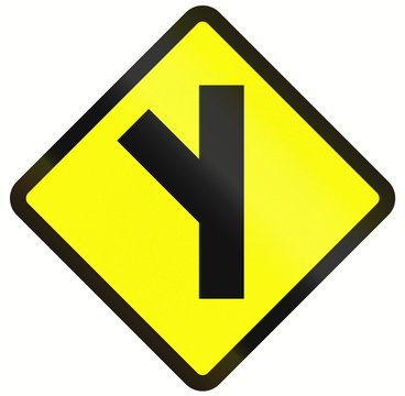Indonesian road warning sign: 3 way intersection ahead