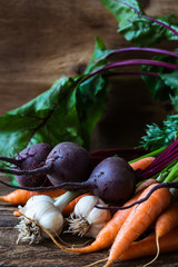 Bunch of fresh organic beetroots, garlic and carrots