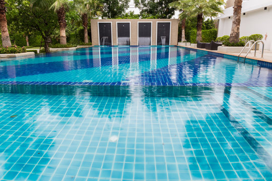 Outdoor Swimming Pool in Garden © supparsorn