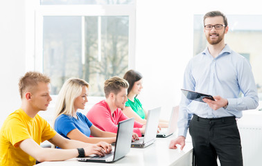 Fototapeta premium Students at the informatics and programming lesson
