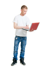 Pupil holding a notebook computer isolated on white