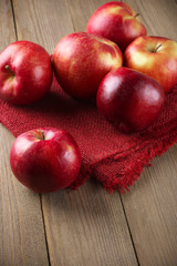 Red apples on napkin