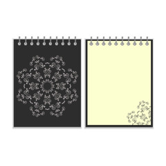 Black cover notebook with round ornate star pattern