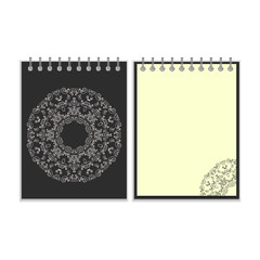 Black cover notebook with round ornate pattern