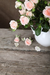 Beautiful pink roses in a white jug