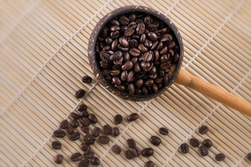 coffee beans in dipper