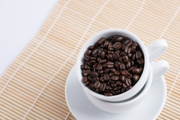 coffee beans in white cup