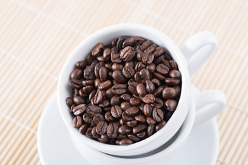 coffee beans in white cup