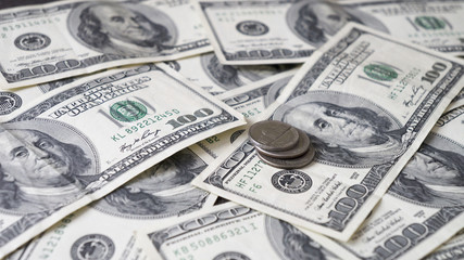 Dollars background with 100 dollars banknotes.