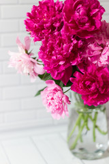 Bouquet of pink peonies in vase