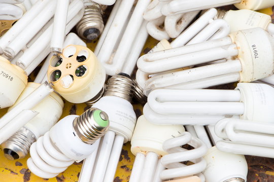 old burnt used fluorescent incandescent bulbs