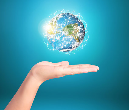 Globe ,earth in human hand, hand holding our planet earth glowin