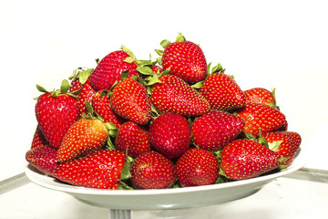 Strawberries on the white bowl