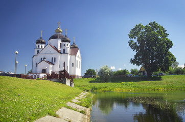 Naklejka premium Orthodox Transfiguration Cathedral on the shore of Oksna river i