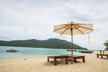 Sun bed and umbrella in Lipe island, Thailand. 