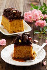 Caramel cake with chocolate decoration.