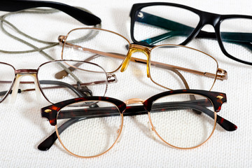  reading glasses on the white table