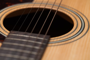Obraz premium detail of classic guitar with shallow depth of field
