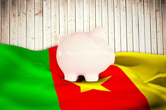 Composite image of piggy bank