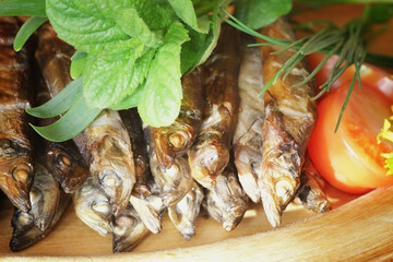 smoked capelin fish with garnish