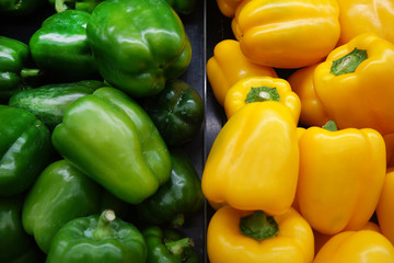 Obraz na płótnie Canvas Green and yellow bell peppers