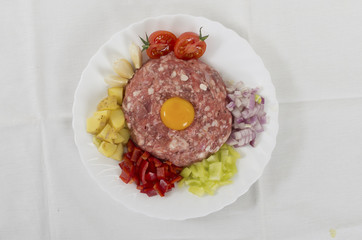 Row meat and chopper with vegetables