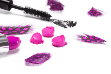 Obraz na płótnie Canvas Black mascara and bright purple lipstick