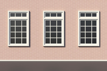 Three windows on white brick wall