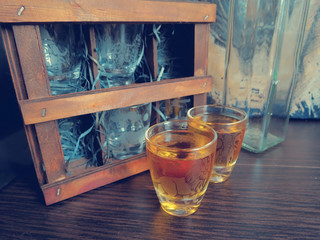 Cognac in etched glass on the table © tishchenko