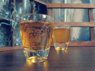 Cognac in etched glass on the table