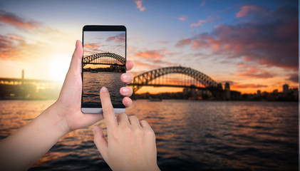 Hand holding smart phone isolated on white background