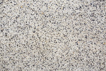 rough texture surface of exposed aggregate finish, made of small