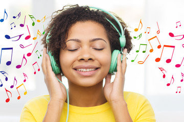 happy woman with headphones listening to music