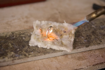 VARANASI, INDIA - MAY: Jeweler Making Jewelry. Handwork. May 15,