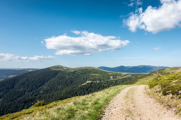 View of beautiful spring mountains with road