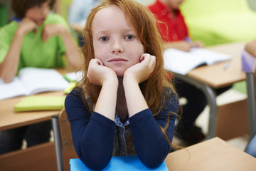 Red head girl in the classroom