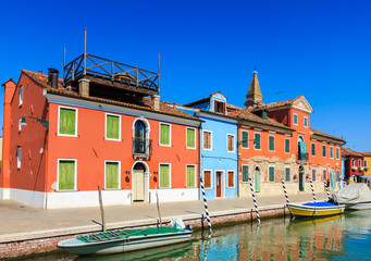 Fototapeta na wymiar Colorful houses, buildings and boats Burano Island, Venice, Italy