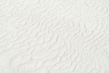 white travertine with wavy shaped lines background