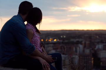 Young tourist couple looking at the views in the city.