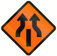 Indonesian temporary road warning sign: Central Reserve With One Way Traffic Ends