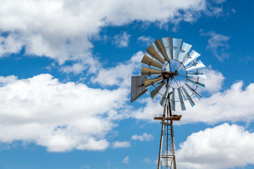 Windmill and beautiful blue sky, USA.