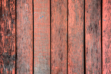 Old red painted grunge wood floor background.