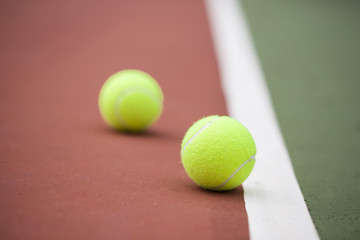 Tennis court with tennis balls