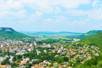 Fototapeta na wymiar City view with mountains