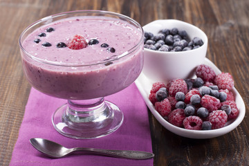  Smoothies of frozen raspberries and   blueberries and   with yo