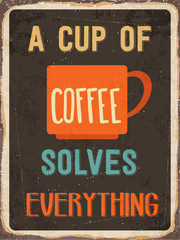 Retro metal sign " A cup of coffee solves everything"