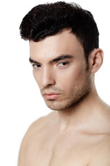 Obraz premium Charming and handsome man face over a white background