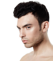 Charming and handsome man face over a white background