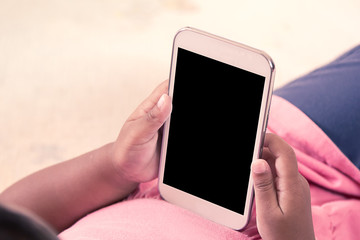 kid's hands hold smart phone,tablet,cellphone for playing and ed